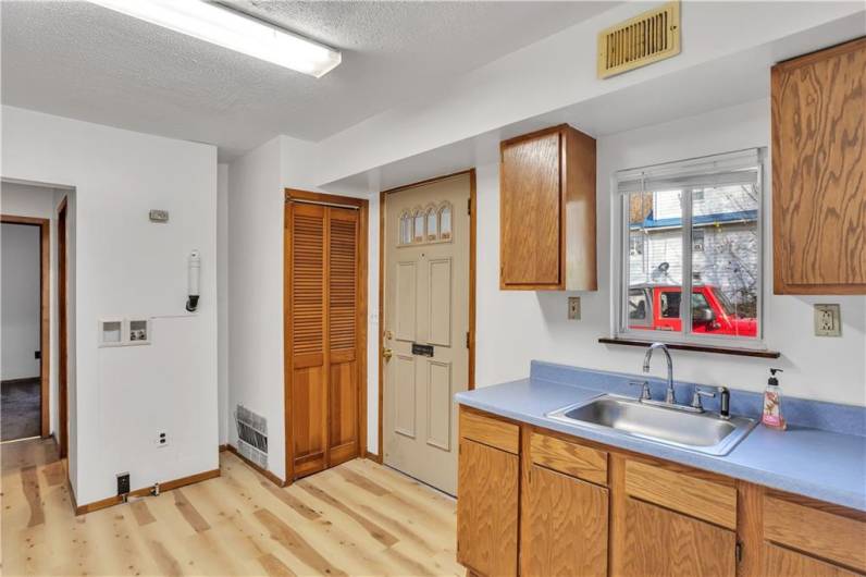 Another view of Kitchen, Apartment 1. Each unit has its own furnace.