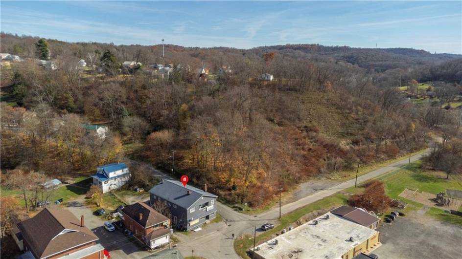 Follow Broadway, Past the 1.5 Acre Lot at Corner to Busy Greensburg Road.