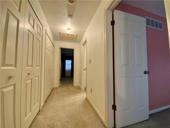 Upstairs hallway.  Look at the closet storage space!