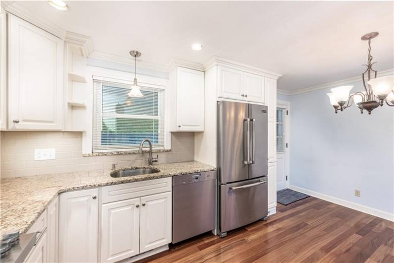 Granite countertops, under cabinet lighting, great storage throughout!