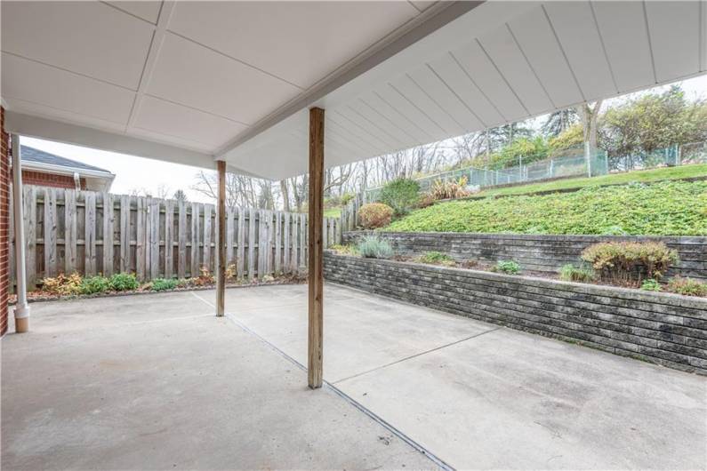 The back patio is directly off of the kitchen.