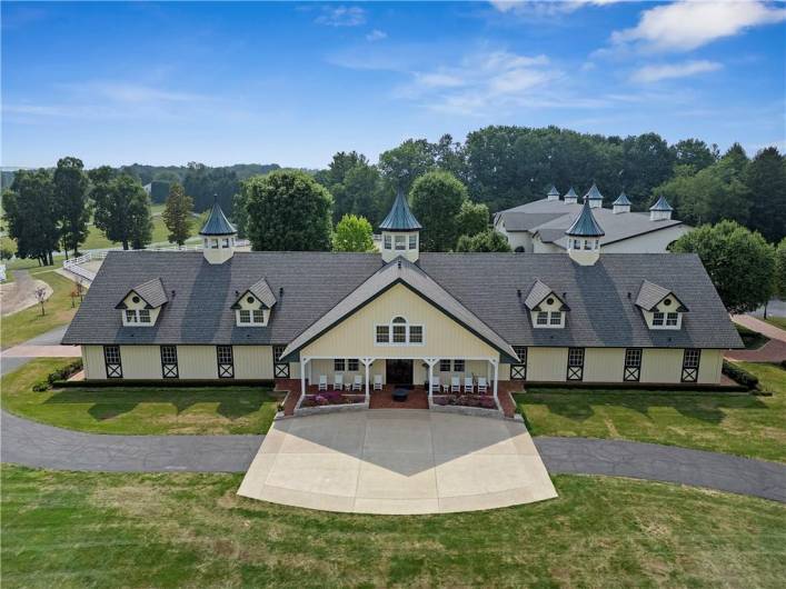 The Luxury Equestrian Facilities - includes top of the line horse stable, indoor and outdoor riding arenas and fenced paddocks