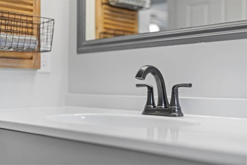 New faucet and counter with sink.