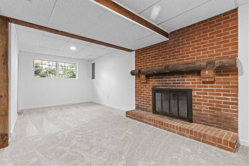 Fireplace and room for office or hobby area.