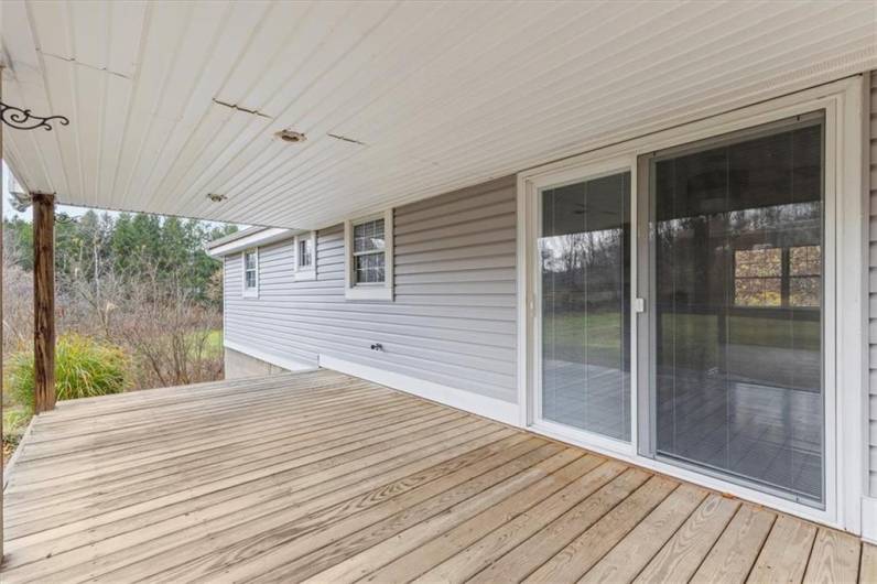 Sliding glass doors from kitchen make outdoor entertaining effortless.