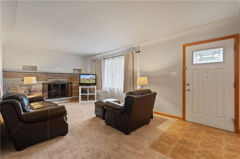 LIVING ROOM AND CERAMIC TILE ENTRY~