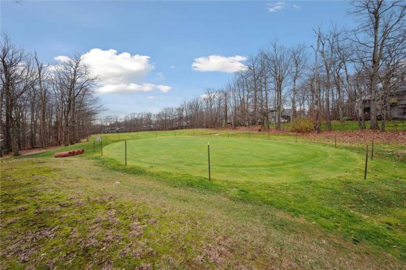 The back of the home abuts the golf course.