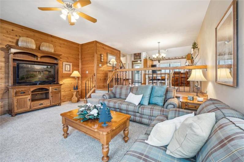 A modern, cedar-plank accent wall adds a sense of warmth to this mountain unit.