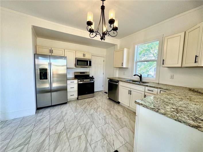 This kitchen and open concept dining room will make preparing meals a breeze!