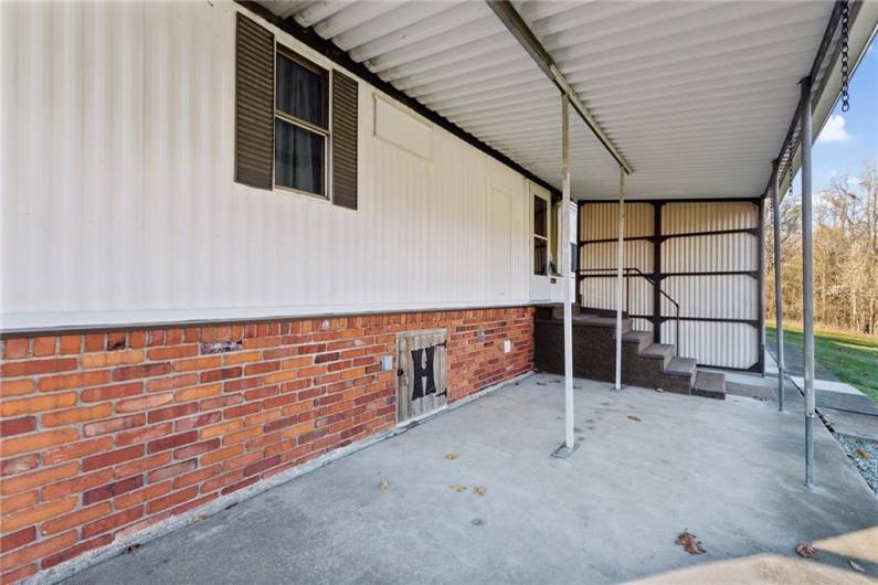 LARGE COVERED FRONT PORCH, GENERATOR HOOK UP, EASY ACCESS TO CRAWL SPACE