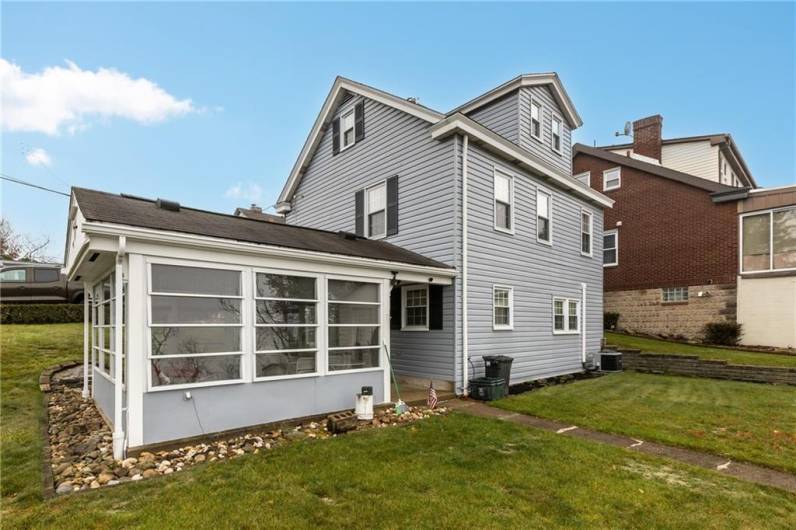 Back view of the house and sunroom/studio