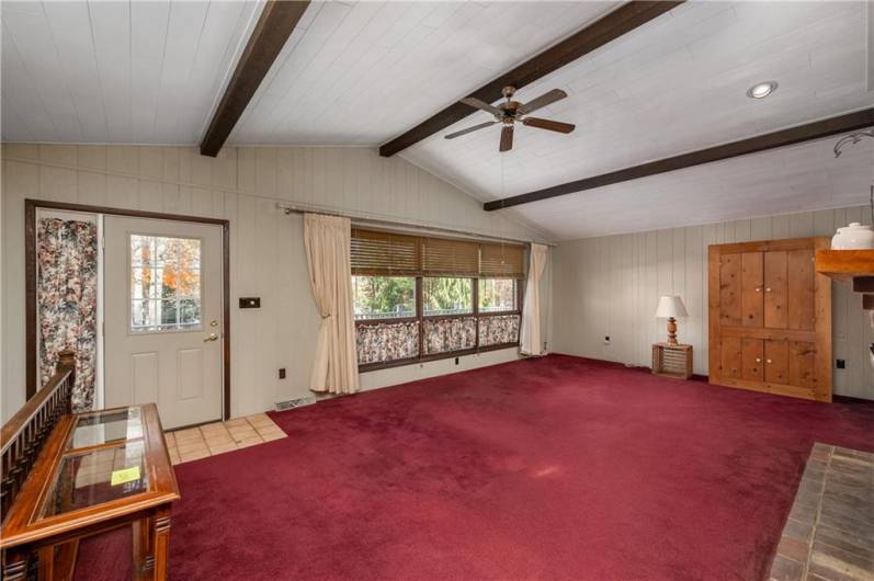 Living Room with wood-burning fireplace