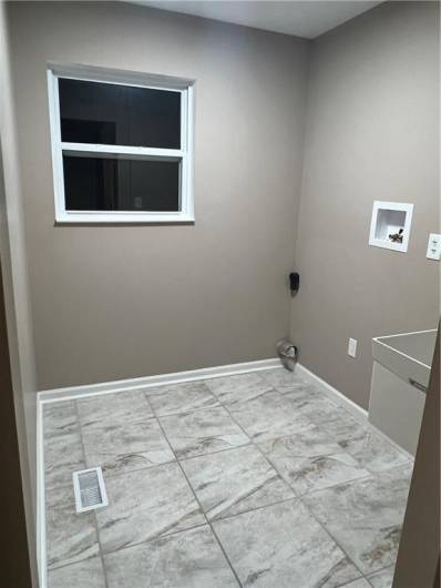 Laundry room off of kitchen