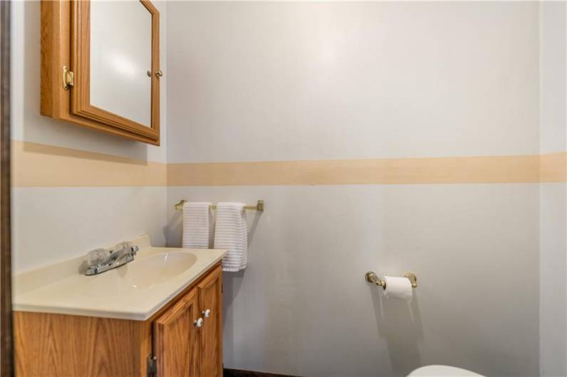 Powder Room for guest in Finished Basement area