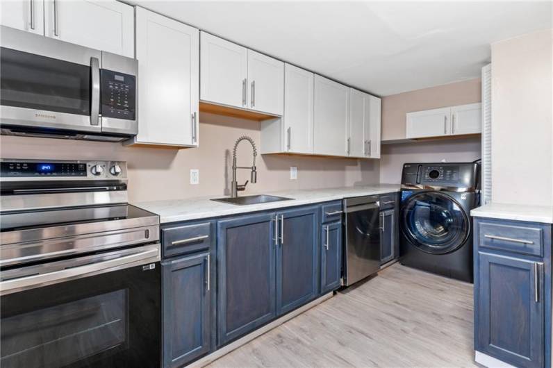 New electric stove and microwave.