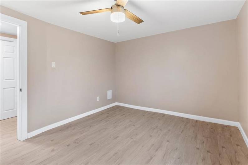 Bedroom 3 - This room offers easy-clean, laminate flooring.