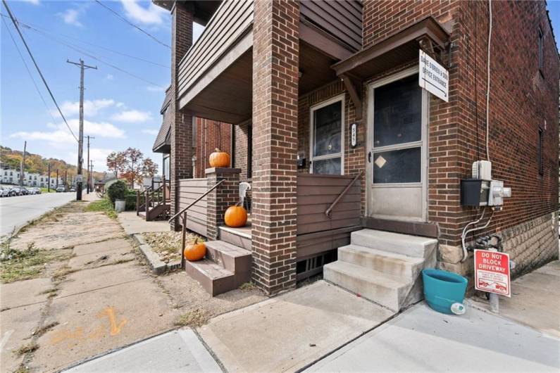 The entry to 545 W 7th Avenue, Apt #2 is via the steps on the right.