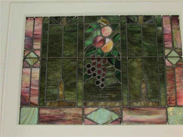 One of five stunning, antique stained-glass windows