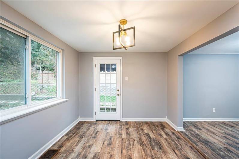 A new side door enables more natural light into the dining area.