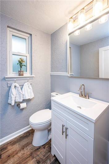 A new remodeled powder room on the first floor.