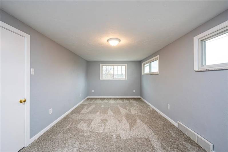 This second floor of the addition features another spacious  primary bedroom (19X10) with double closets. This ceiling and one wall are brand new!