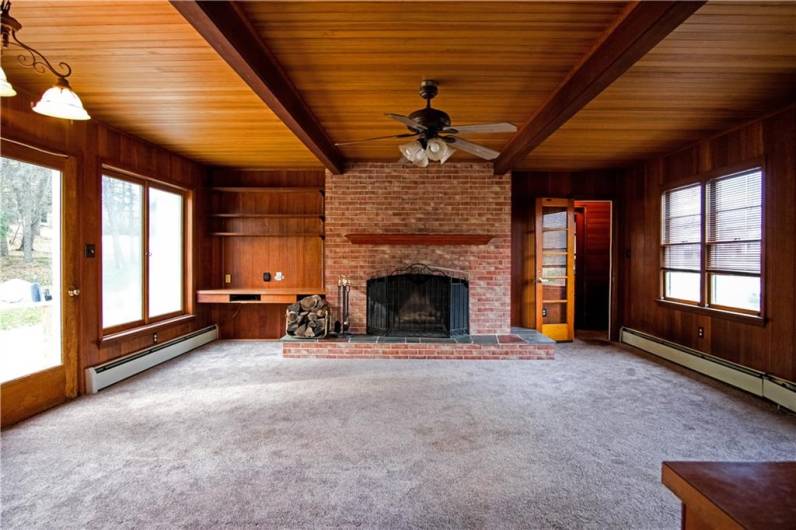 Enjoy plenty of family fun in this large family room with a wood burning fireplace!