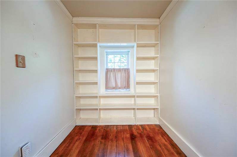 Top of the stairs with built-ins.