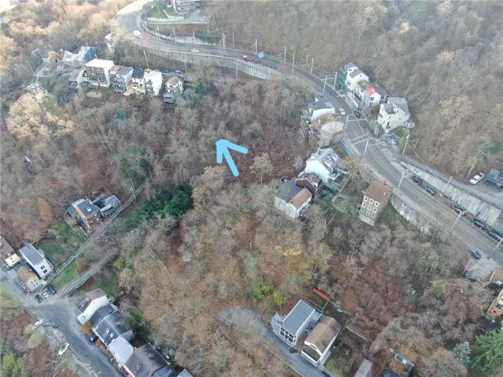 0 Hartford St is where the arrow is pointing, and you can see the public stairway that leads down the slope-just to the left of the property.