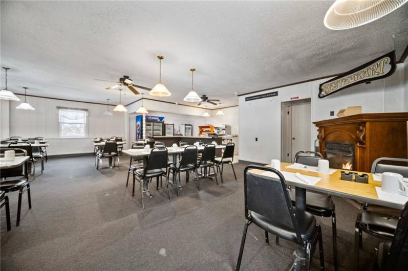 Another view of 2nd half of Dining Area with serving island in background.