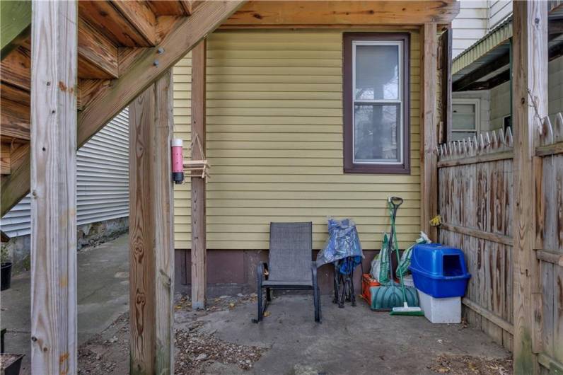 Partially Covered Area of the Patio Under the Upper Deck.