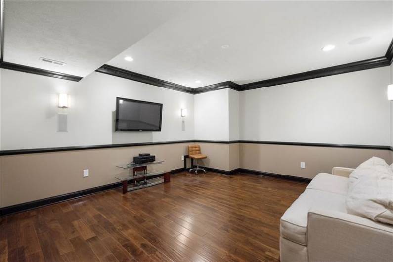 Lower Level Media Room perfect for Movie Night or watching your favorite team play.