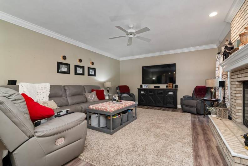 family room off of the kitchen and sunroom view 2