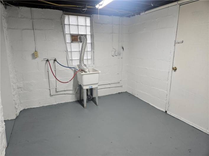 Washer and Dryer hook up in Basement with walk out to backyard