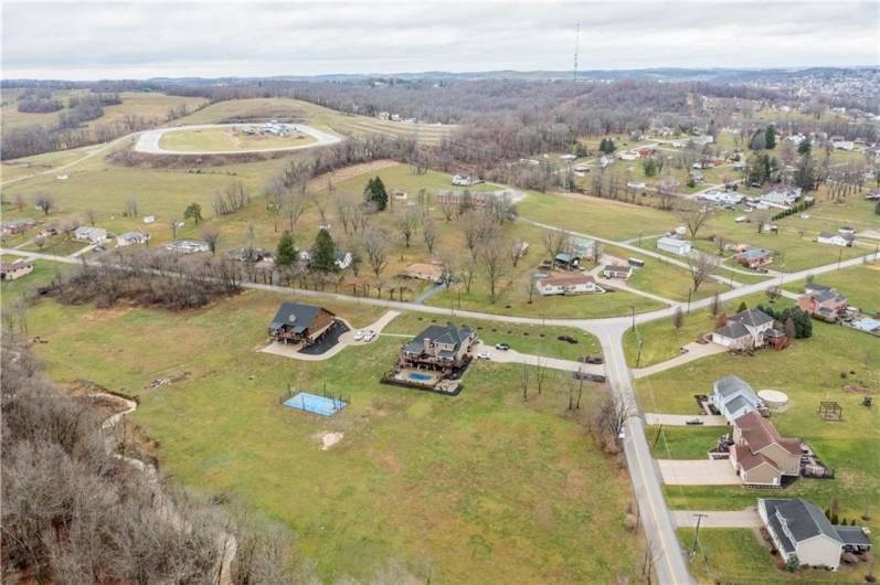 There are three newer construction homes across the street from this lot.