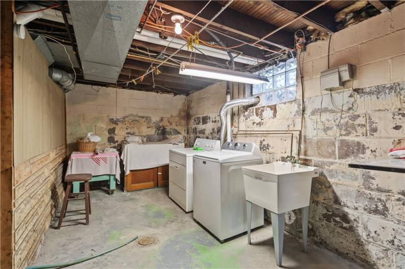 Laundry room in basement. Tons more storage and DRY!