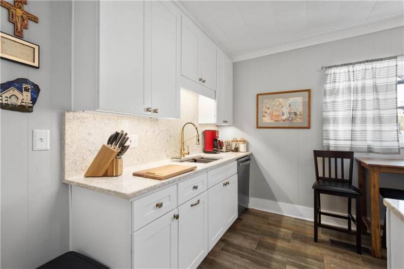 Spacious sink area and lots of counter space.