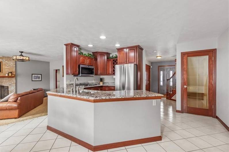 Granite countertops, Whirlpool stainless steel appliances