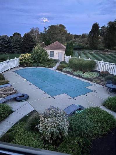 Backyard pool area during Sunset