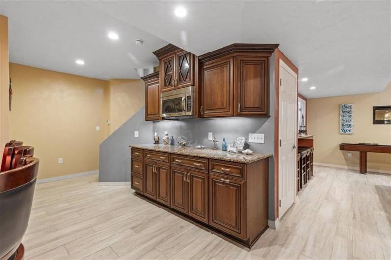 Full finished basement - three-zone heated tile flooring