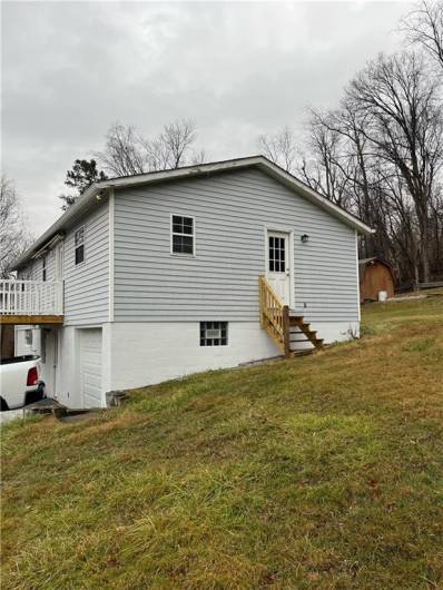 Side of house and Yard