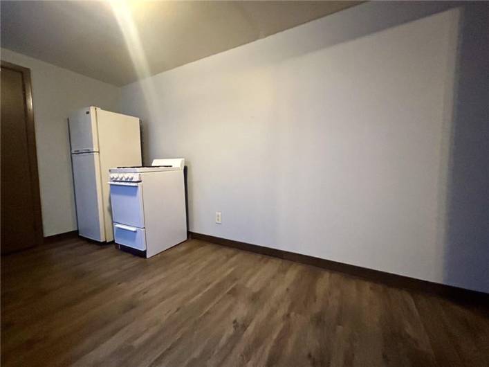 Gas stove and refrigerator stay with unit.