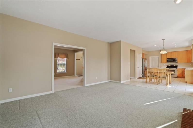 You'll love how the family room is open to both the kitchen & living room...