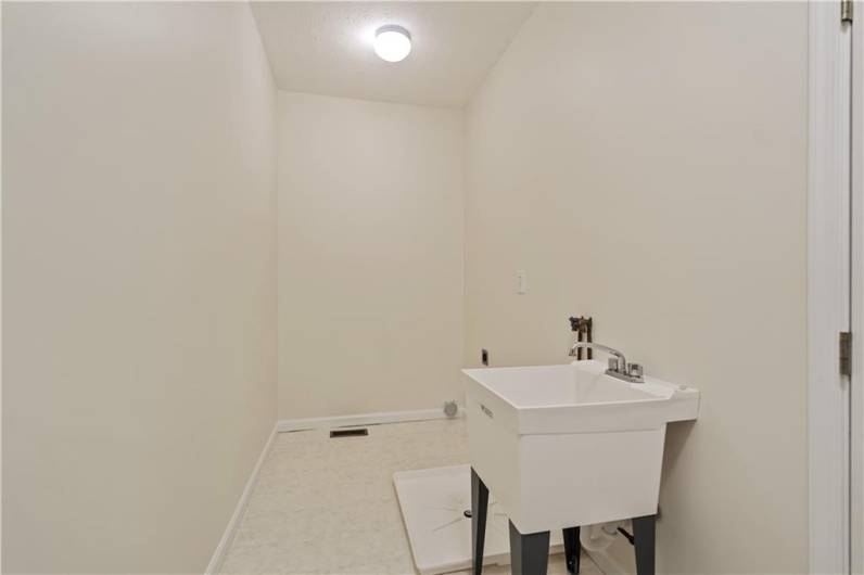 Enjoy a MAIN FLOOR laundry room...