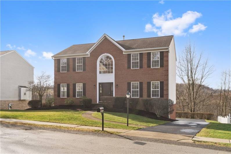 Brick-front & great landscaping make for awesome curb appeal...