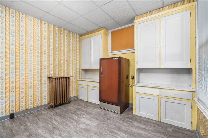 Another view of the kitchen on the first floor. with original built-ins.