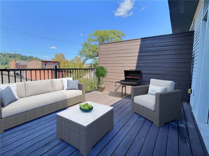 Deck off of the kitchen on the main floor