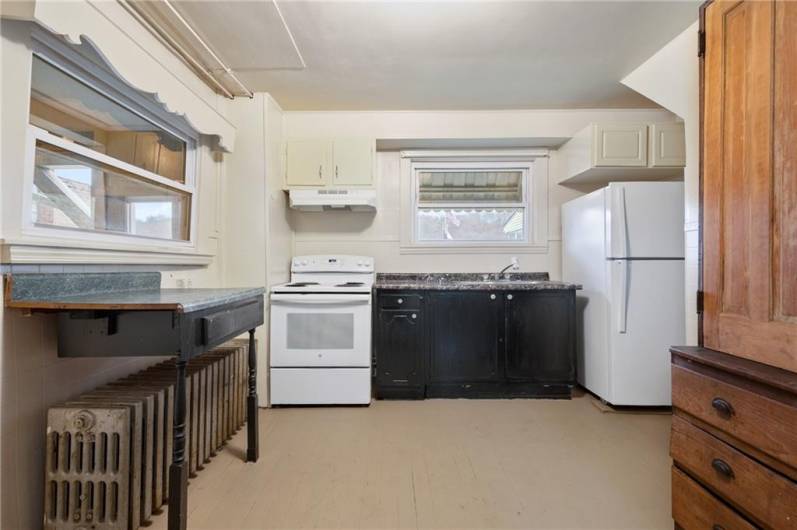 The window above the stainless steel sink has wonderful unobstructed views of the back yard -- and the Allegheny River!