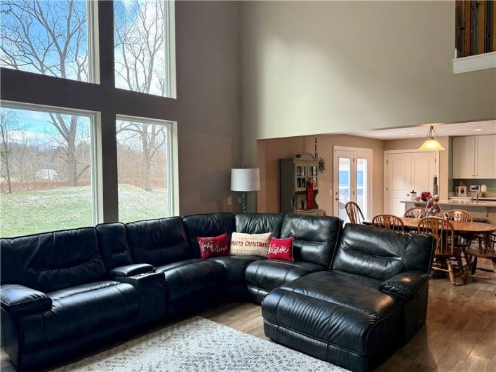 View of Living Room into the Open Eat-in-Kitchen area.