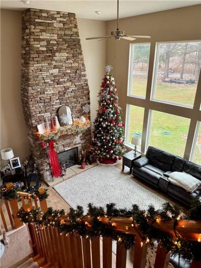 View from the Upper Level to the Living Room below.