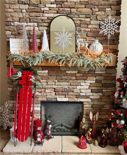 Close up of beautiful Stone Fireplace. (electric heat)